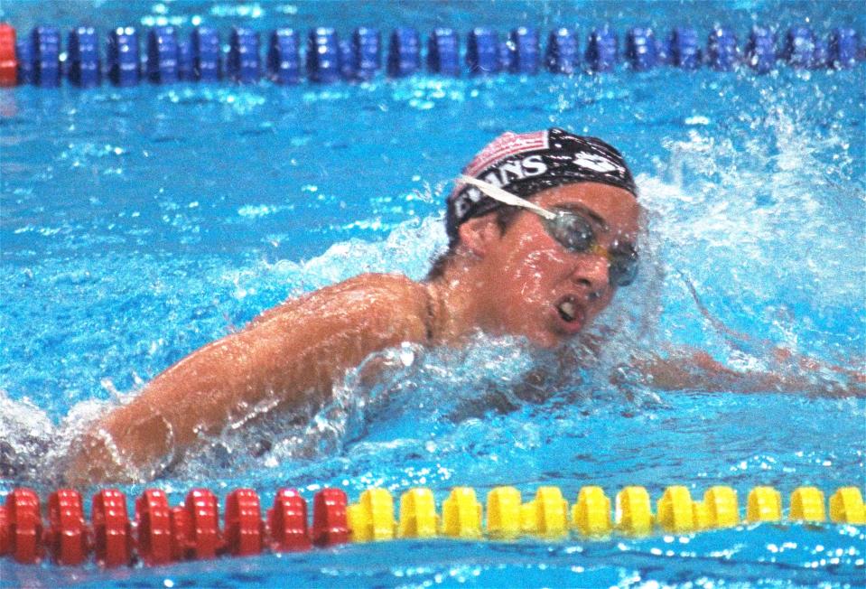 U.S. swimmer Janet Evans strokes her way to a win in a preliminary women's 400-meter freestyle race in Seoul September 22, 1988. (AP Photo/Eric Risberg)