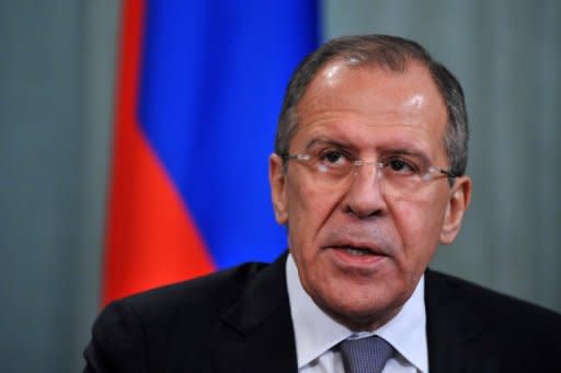 Russian Foreign Minister Sergei Lavrov answers questions during a press conference on February 8. Russia has accused the United States of trying to influence its election process by funding opposition groups in advance of Vladimir Putin's expected return to the Kremlin in the weekend poll