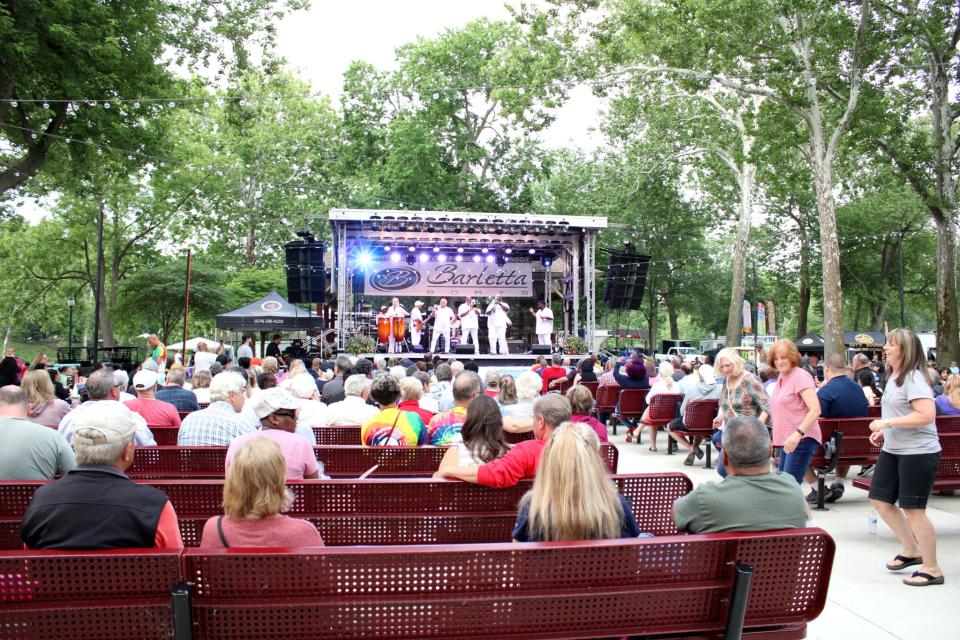 Local musicians entertain at Elkhart's annual Rhapsody Arts and Music Festival in June.