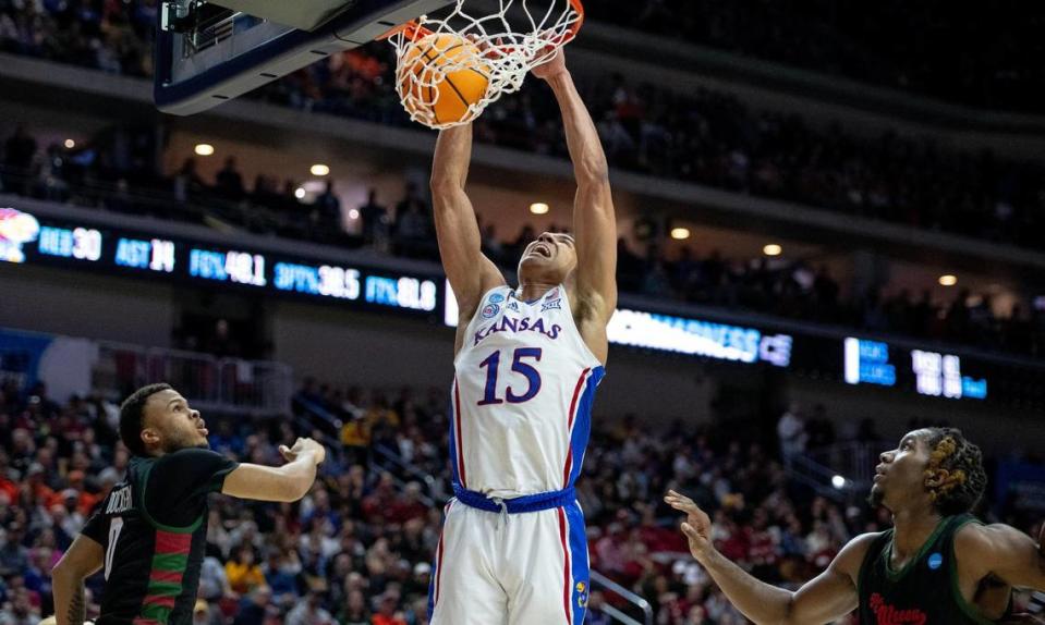 Kansas guard Kevin McCullar Jr. (15) dunks against Howard during a first-round college basketball game in the NCAA Tournament Thursday, March 16, 2023, in Des Moines, Iowa.