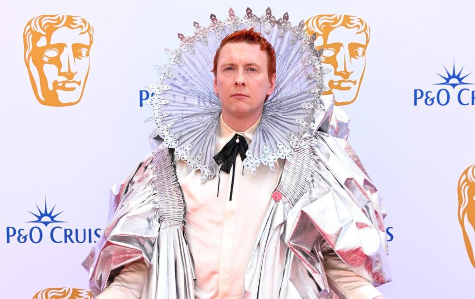 Comedian and presenter Joe Lycett dresses as Elizabeth I after losing a bet with two aunts