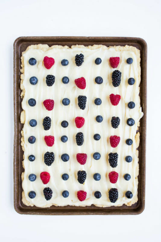 <p>Reluctant Entertainer</p><p>The perfect summer sweet treat with fresh berries on top.</p><p><strong>Get the recipe: <a href="https://reluctantentertainer.com/4th-july-easy-sugar-cookie-bars/" rel="nofollow noopener" target="_blank" data-ylk="slk:Easy Sugar Cookie Bars;elm:context_link;itc:0;sec:content-canvas" class="link ">Easy Sugar Cookie Bars</a></strong></p>