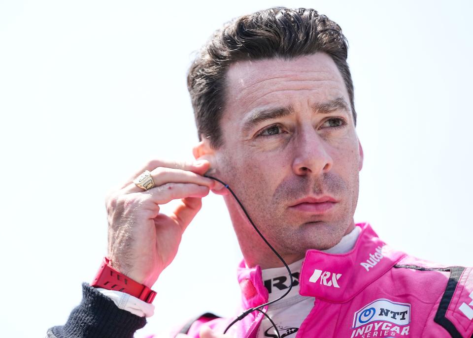 Meyer Shank Racing driver Simon Pagenaud (60) puts in earplugs for the final GMR Grand Prix practice on Friday, May 13, 2022, at Indianapolis Motor Speedway in Indianapolis. 