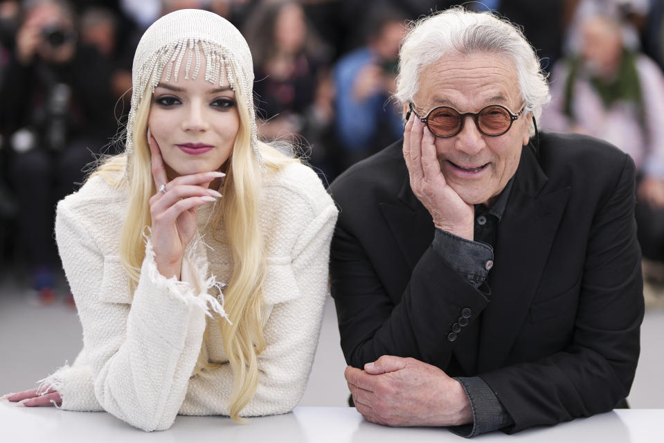 Anya Taylor-Joy, left, and director George Miller pose for photographers at the photo call for the film 'Furiosa: A Mad Max Saga' at the 77th international film festival, Cannes, southern France, Thursday, May 16, 2024. (Photo by Scott A Garfitt/Invision/AP)
