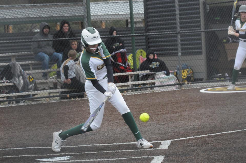 Salina South's Lainey Howard (15) swings at a pitch during a doubleheader against Maize South Tuesday April 19, 2022 at Salina Softball Diamonds.