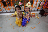 <p>Children dressed up as Hindu Lord Krishna pose during Janmashtami festival celebrations marking the birth anniversary of Krishna in Agartala, India Aug. 25, 2016. (Photo: Jayanta Dey/Reuters) </p>