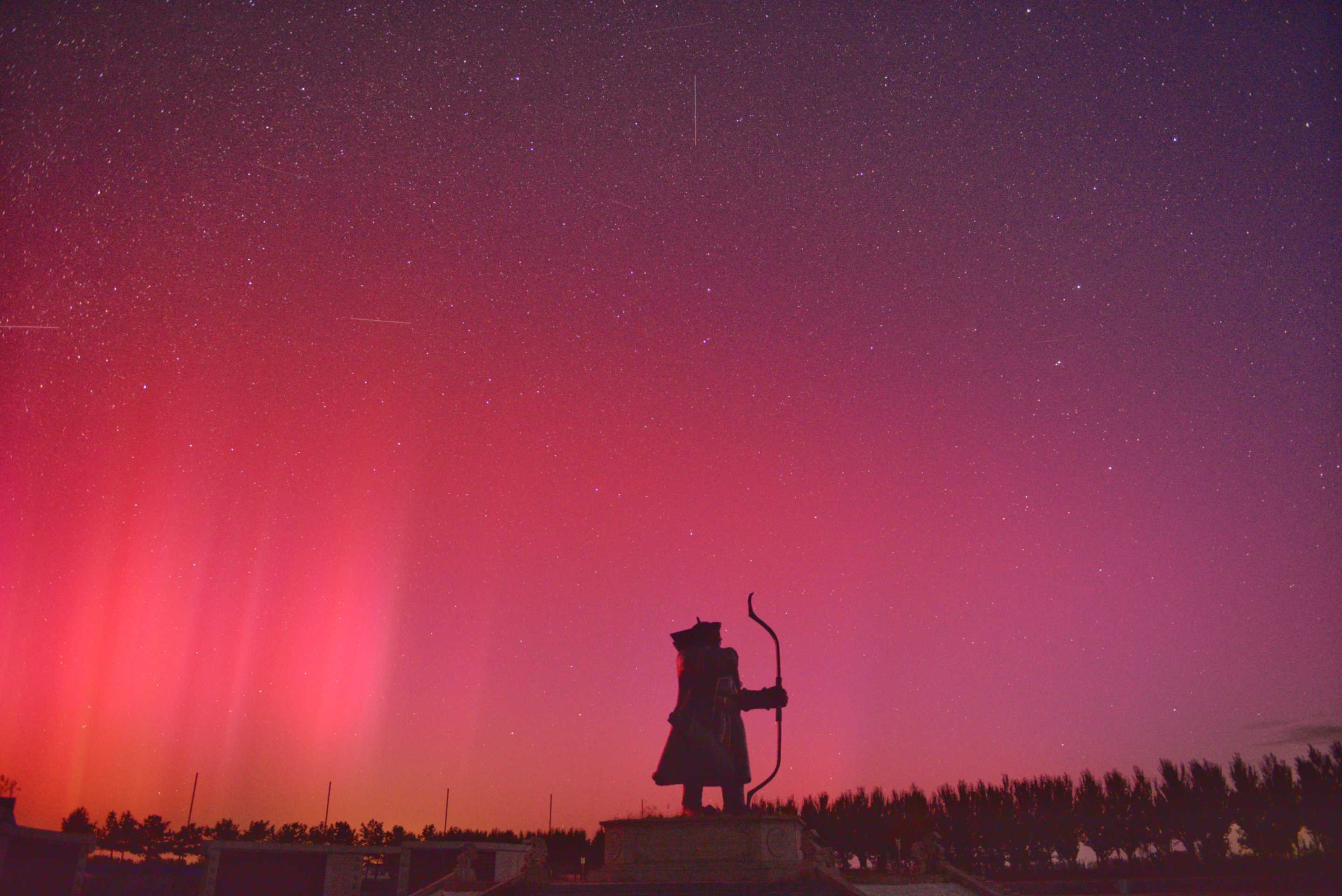 Aurora borealis, or northern lights, illuminate the sky over the Jinshanling Great Wall on October 11, 2024 in Daqing, Heilongjiang Province of China. (VCG via Getty Images)