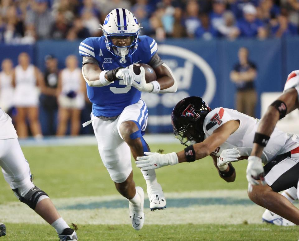 Brigham Young Cougars running back Aidan Robbins (3) runs against the Texas Tech Red Raiders in Provo on Saturday, Oct. 21, 2023. BYU won 27-14.