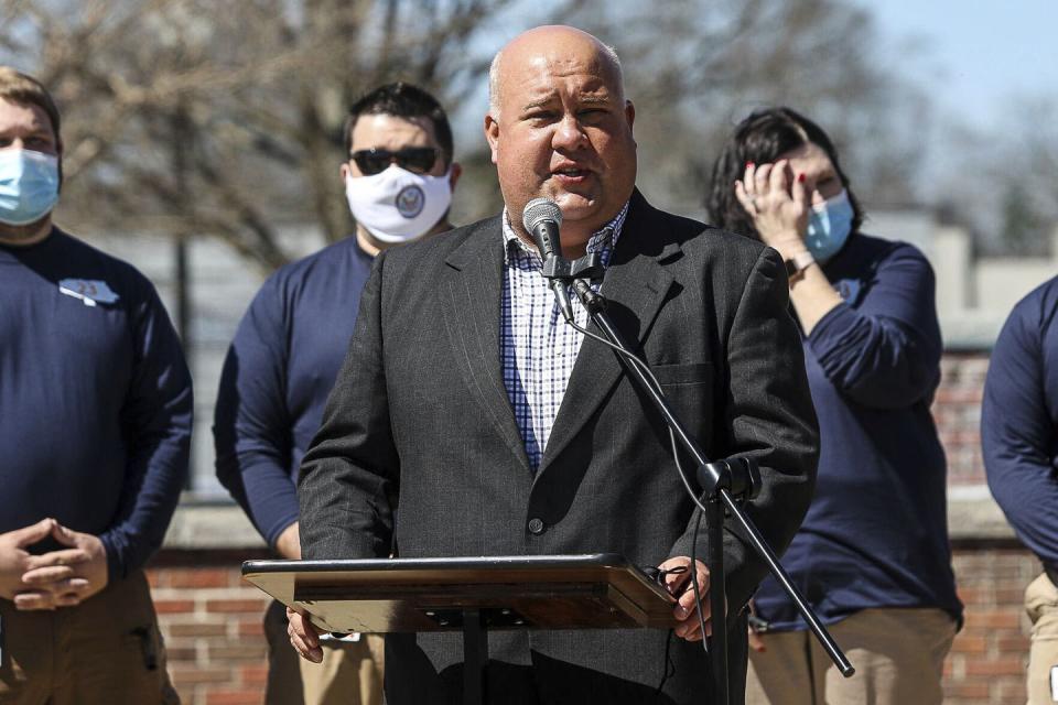 a man speaking into a microphone