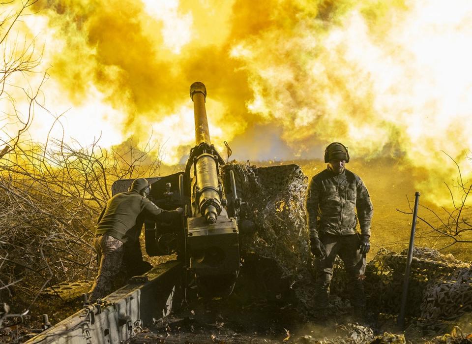 A Ukrainian soldier from an artillery unit fires towards Russian positions outside Bakhmut (AFP via Getty)