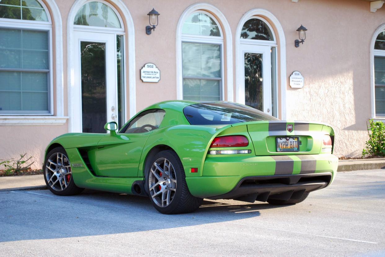 green dodge viper in parking lot