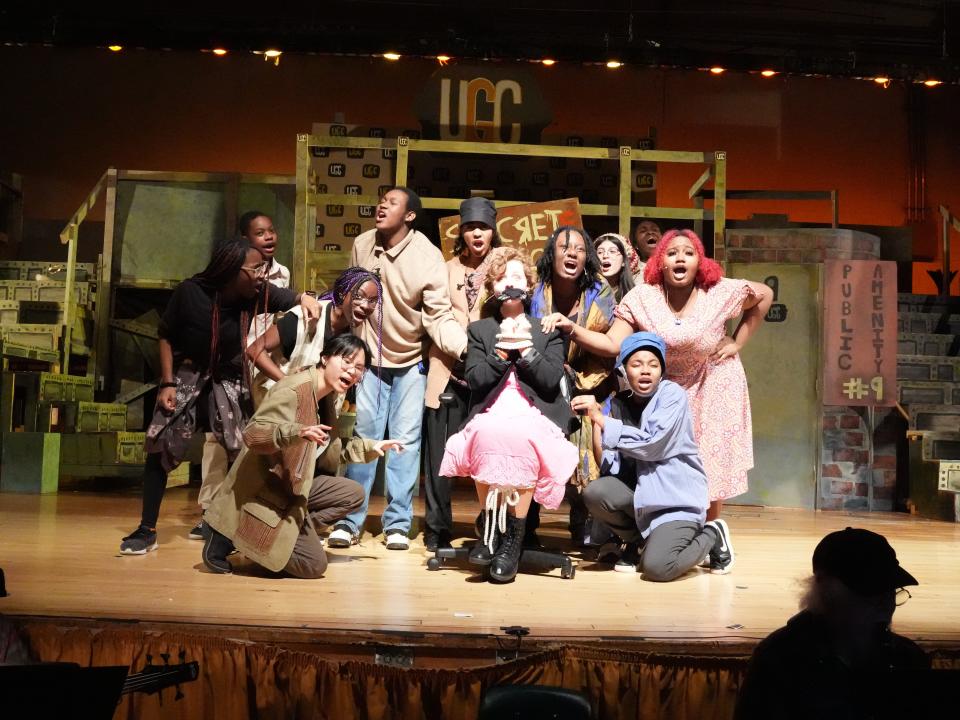 The cast of "Urinetown" at Ramapo High School includes, from left: Eden Charles-Pierre (Rebel), Beasley Polynice (Rebel/Old Man Strong), Onyeomachi Ndukwe (Robby the Stockfish), Jeannine Fallurin (Rebel/Dr. Billeaux), Dakarai Smith (Tiny Tom), Cameron Grace Stevens (Hot Blades Harry), Natasha Brosius (Hope Cladwell), Rosezlia Christophe (Little Becky Two-Shoes), Vanessa Nova (Rebel), Dara Noel (Rebel/McQueen), Nilah Spencer (Soupy Sue), and Sarine Lamy (Little Sally). Performances are at 7:30 p.m., April 12, 13; 2 p.m., April 14.