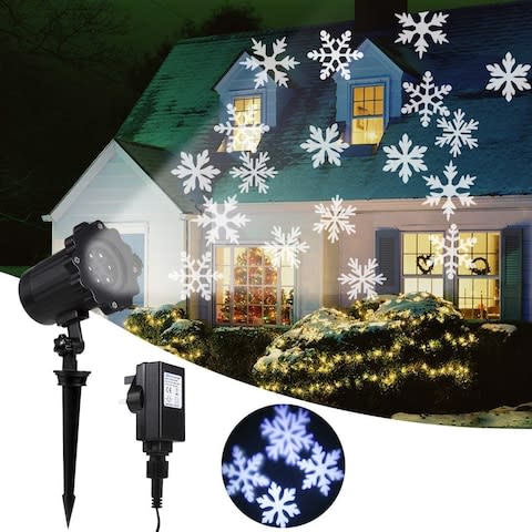 LED Snowflake Light Projector - Credit: Amazon