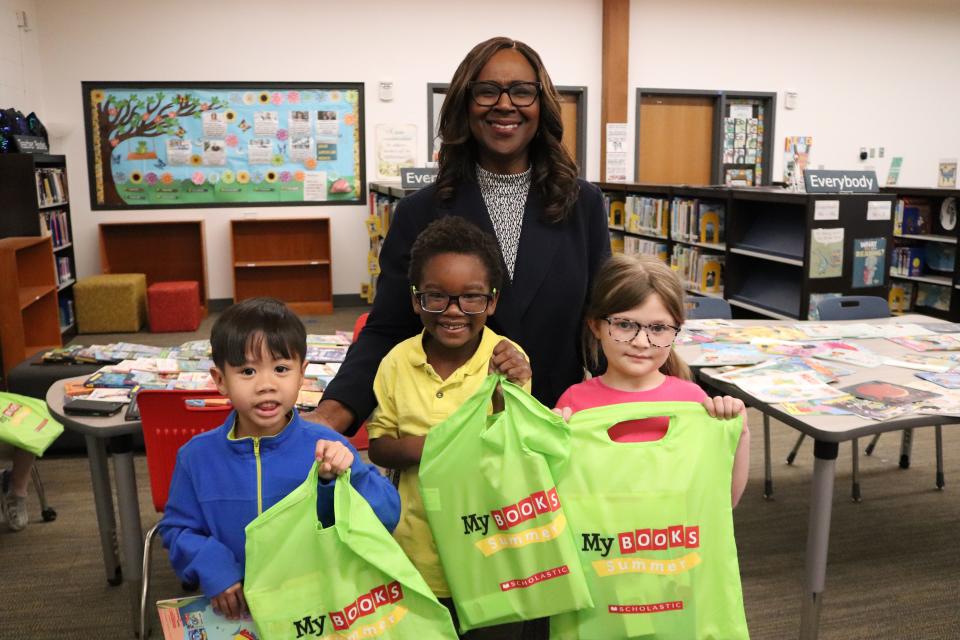 Superintendent Grenita Lathan distributed free books and educational magazines to students at Sunshine and Weaver elementary schools on May 13. It has become an end-of-year tradition for Lathan, an avid reader, as a way to encourage summer reading.