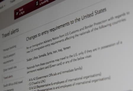 A picture of the travel advisory page of Qatar Airways advising passengers bound for the United States from seven newly banned majority Muslim countries that they need to have either a U.S. green card or diplomatic visa, January 28, 2017 in London, Britain. Picture taken January 28, 2017. REUTERS/Russell Boyce