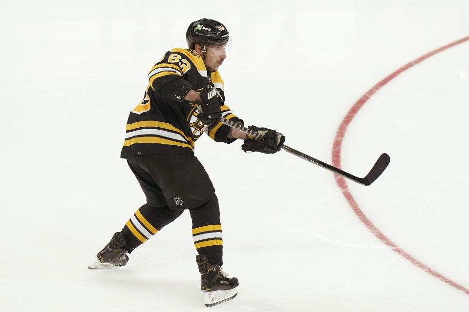 Boston Bruins' Brad Marchand scores in the third period of Game 4 of an NHL hockey Stanley Cup first-round playoff series, Sunday, May 8, 2022, in Boston. (AP Photo/Steven Senne)