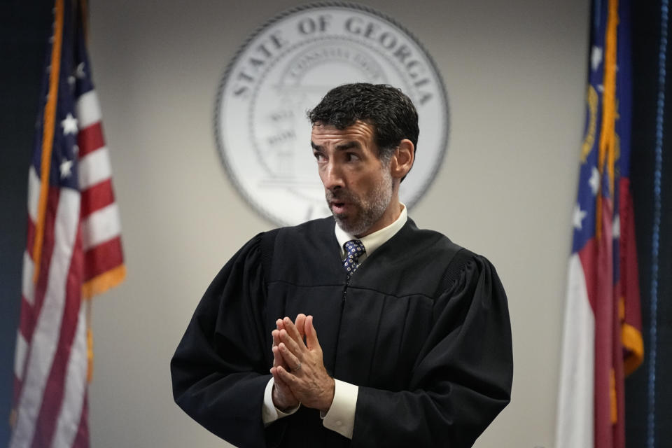 Fulton County Superior Court Judge Robert McBurney speaks in court in the Fulton county courthouse, Tuesday, July 11, 2023, in Atlanta. A grand jury being seated Tuesday in Atlanta will likely consider whether criminal charges are appropriate for former President Donald Trump or his Republican allies for their efforts to overturn his 2020 election loss in Georgia. (AP Photo/Brynn Anderson)