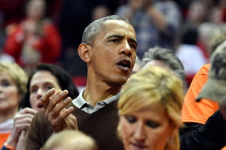 Mar 21, 2015; College Park, MD, USA; The President of the United States, Barack Obama looks on before a game between the Princeton Tigers and the Green Bay Phoenix during the first round of the women's NCAA Tournament at Xfinity Center. Derik Hamilton-USA TODAY Sports