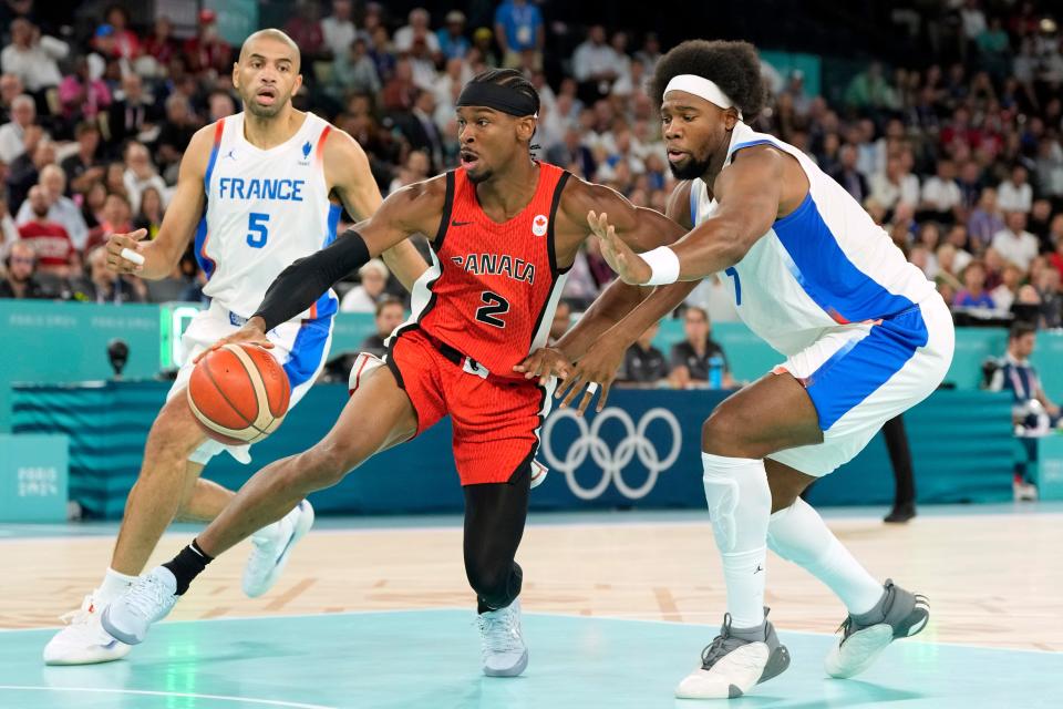 PHOTOS Best images from Canada's 8273 loss to France in 2024 Olympics Yahoo Sports