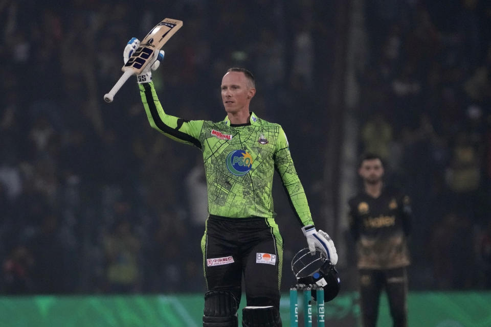 Lahore Qalandars' Rassie van der Dussen celebrates after scoring century during the Pakistan Super League T20 cricket match between Lahore Qalandars and Peshawar Zalmi, in Lahore, Pakistan, Sunday, Feb. 25, 2024. (AP Photo/K.M. Chaudary)