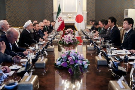 Iranian President Hassan Rouhani meets with Japan's Prime Minister Shinzo Abe, and officials in Tehran