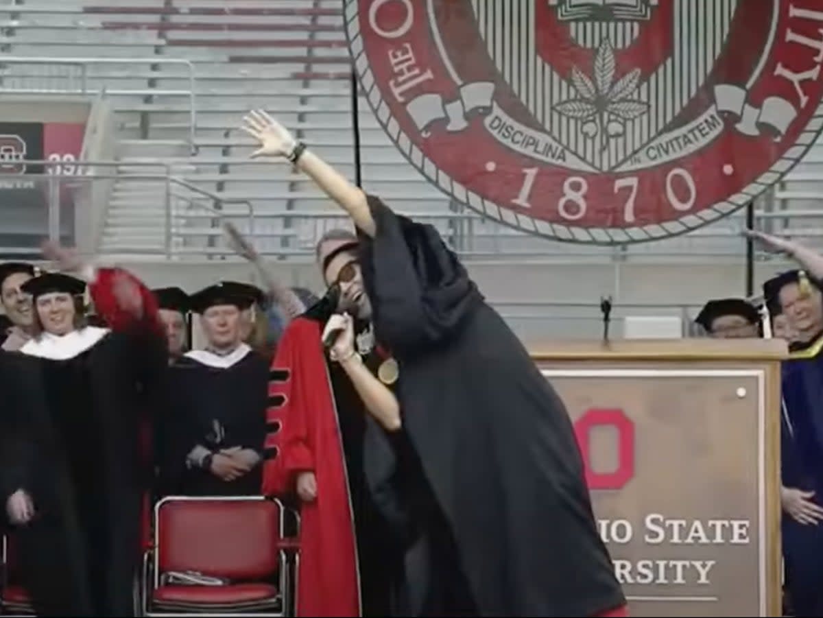 Chris Pan, a ‘social entrepreneur’ and crypto advocate who was selected to give Ohio State University’s commencement address leads a sing-a-long during the ceremony on 5 May, 2024 (screengrab/ NBC 4 Columbus)