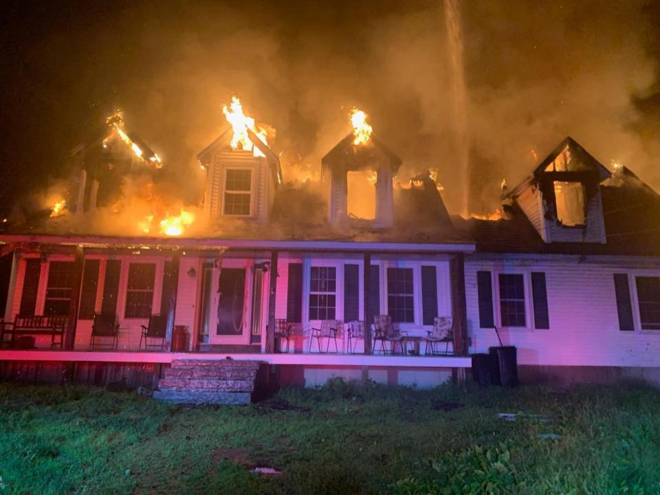 A Milton home was engulfed in flames Wednesday morning on June 29, 2022.