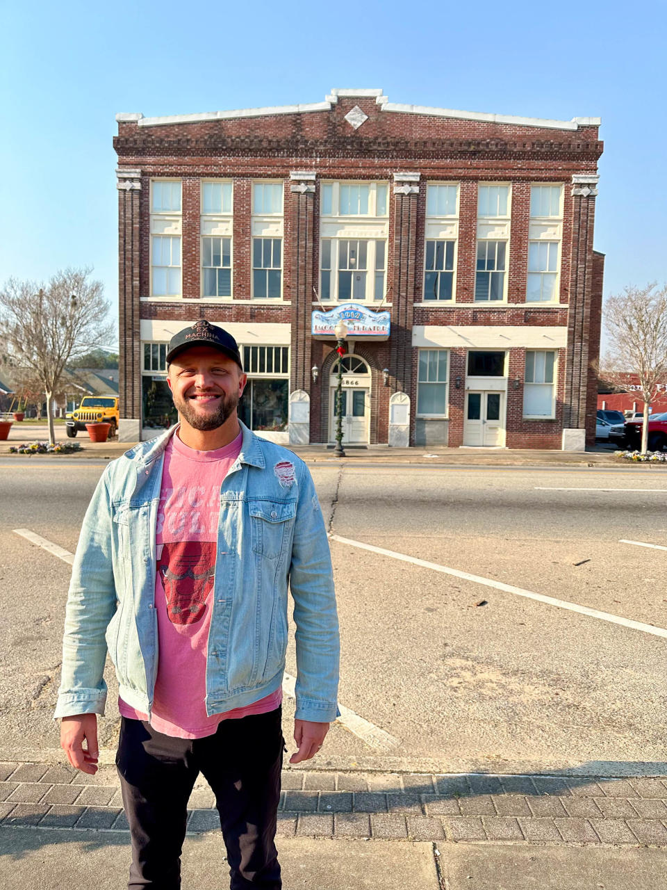 Josh Lipscomb, a lead pastor at Liberty Church, stands in front of the 111-year-old Imogene Theatre in downtown Milton on Tuesday, Dec. 19, 2023. The church has purchased the building from the Santa Rosa Historical Society in what is being touted as a winning scenario for all involved.