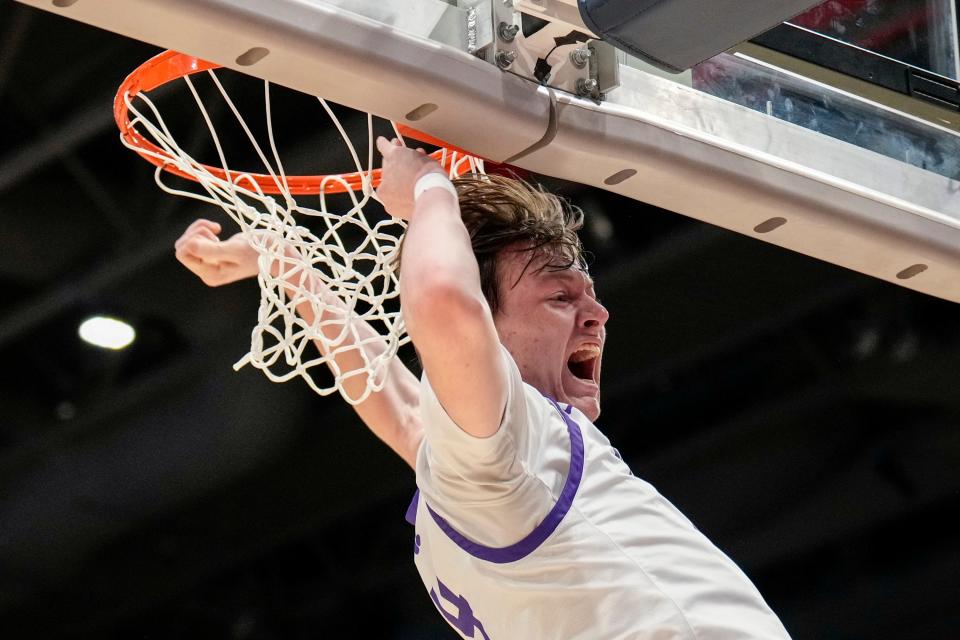 Pickerington Central's Gavin Headings reacts after a dunk during the state final.