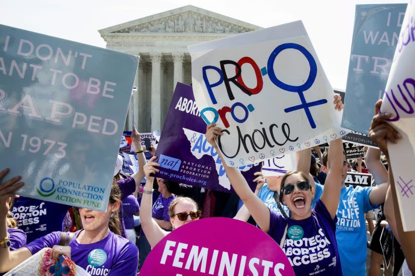 Abortion-rights supporters celebrate outside the Supreme Court on Monday after the ruling in Whole Woman's Health vs. Hellerstedt was announced.