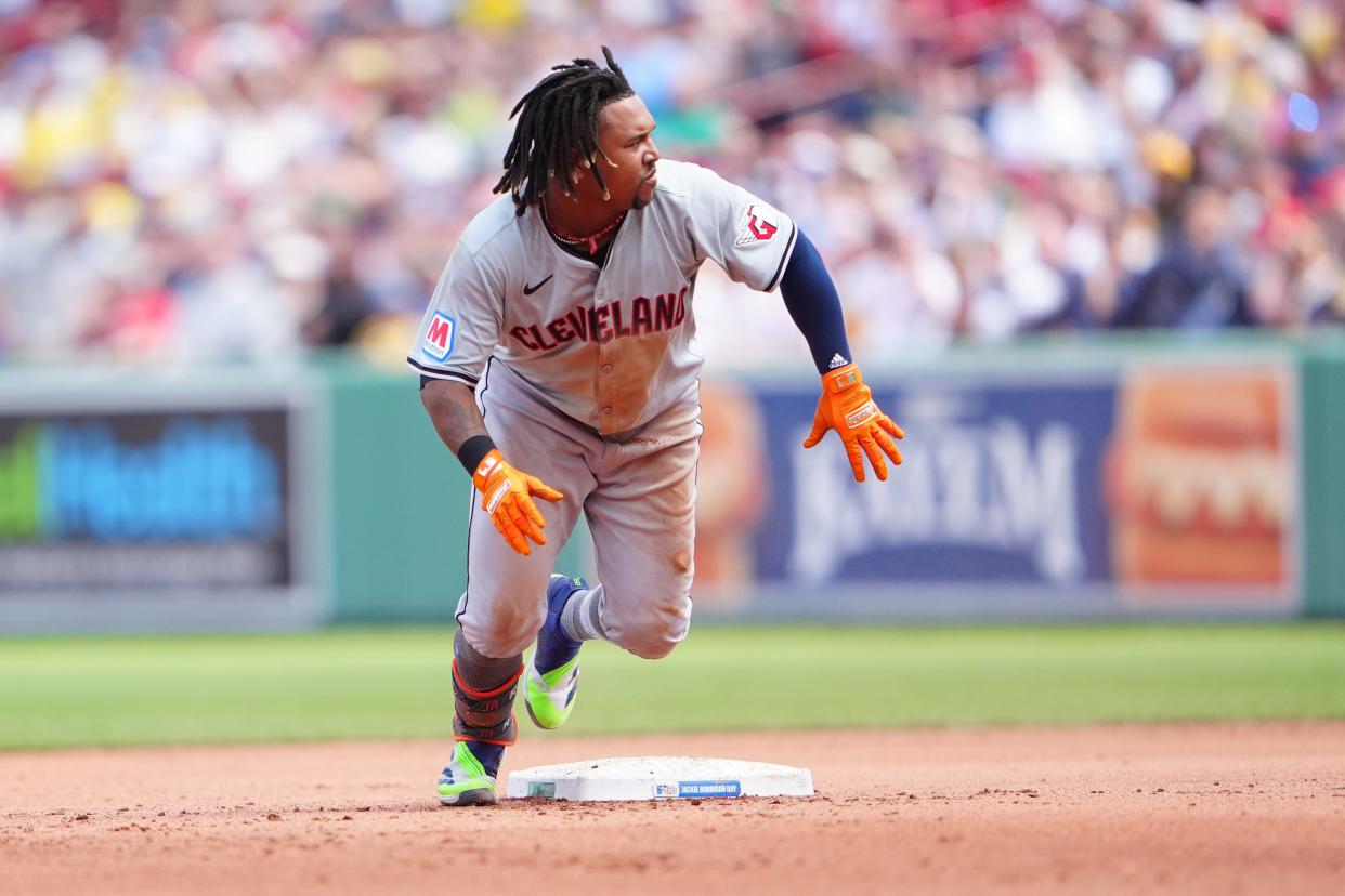 Apr 15, 2024; Boston, Massachusetts, USA; Cleveland Guardians designated hitter Jose Ramirez (42) rounds second base with an RBI double against the Boston Red Sox during the eighth inning at Fenway Park. Mandatory Credit: Gregory Fisher-USA TODAY Sports