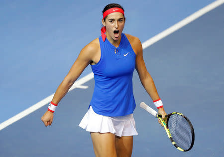 Tennis - Fed Cup Final - France v Czech Republic - Strasbourg, France - 12/11/16 France's Caroline Garcia celebrates her win of the first set during her match against Czech Republic's Petra Kvitova. REUTERS/Vincent Kessler