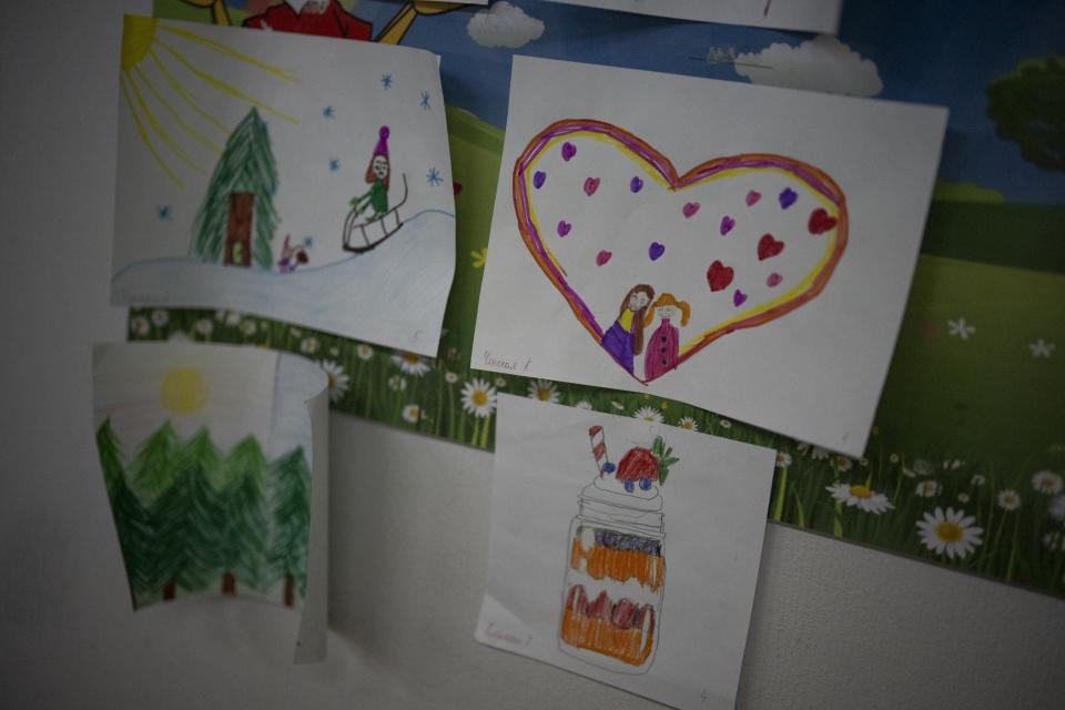 Drawings hang in a classroom at the Barentsburg's school during a celebration of Orthodox Christmas in Barentsburg, Norway, Saturday, Jan. 7, 2023. (AP Photo/Daniel Cole)