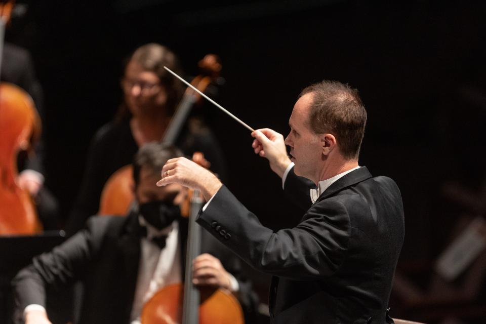 Springfield Symphony Orchestra Music Director and Conductor Kyle Pickett conducts the orchestra during a performance. The Springfield Symphony Orchestra is opening "Swan Lake" with the St. Louis Ballet on Saturday, April 22, 2023. This concert will be the orchestra's first collaboration with a full ballet.