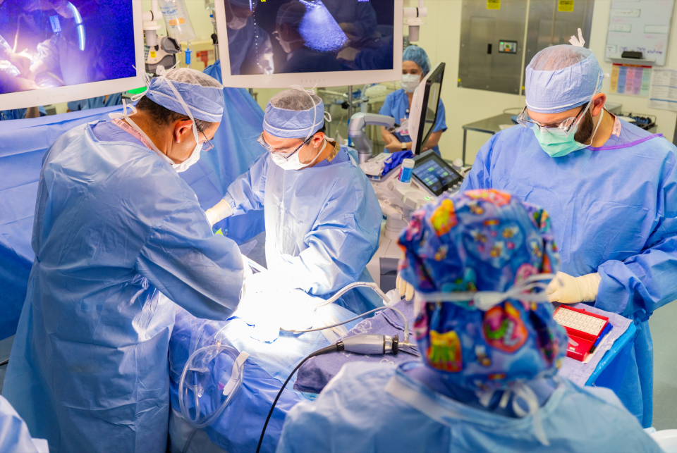 Chris Derderian, MD, of Children's Hospital Colorado performs a fetoscopic myelomeningocele spina bifida repair on Las Cruces mother, Katarina Torrez and her baby, Emilio, in late summer 2023.