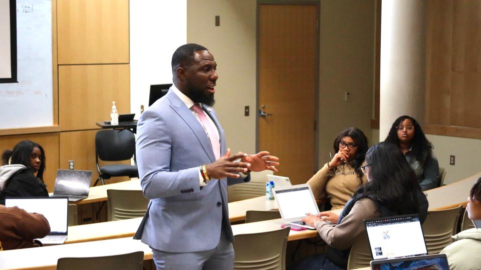 Professor Wesley Bellamy talks with students during his Seminar on Black Politics class Wednesday afternoon.