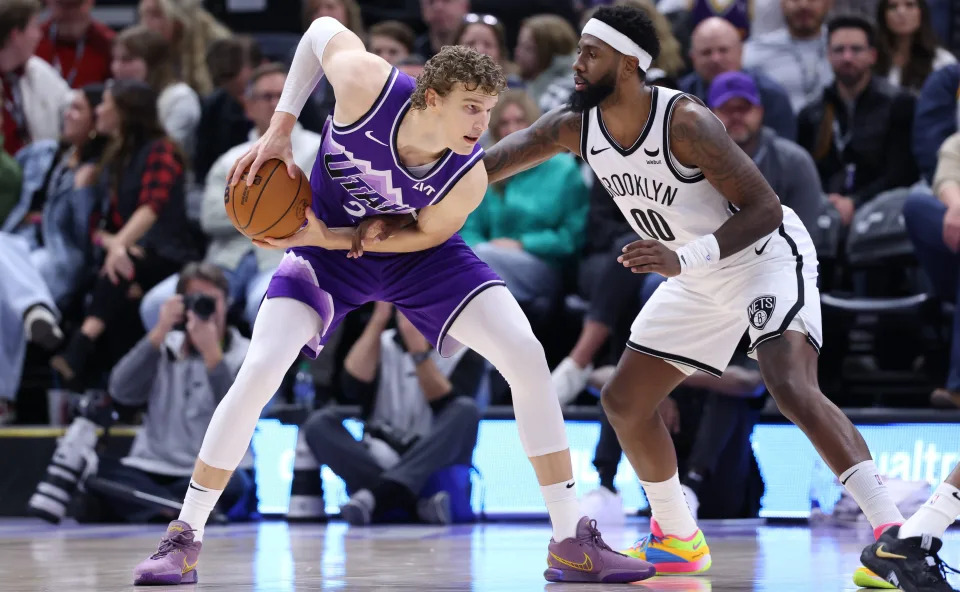 Utah Jazz forward Lauri Markkanen (23) posts up against Brooklyn Nets forward Royce O'Neale (00) during the fourth quarter at Delta Center in Salt Lake City on Dec. 13, 2023.