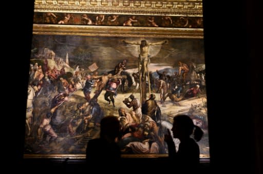 Tintoretto's works such as The Crucifixion decorate the venue, the backdrop for the Gucci collection whose blueberry blues and cabernet reds echoed shades the artist deployed