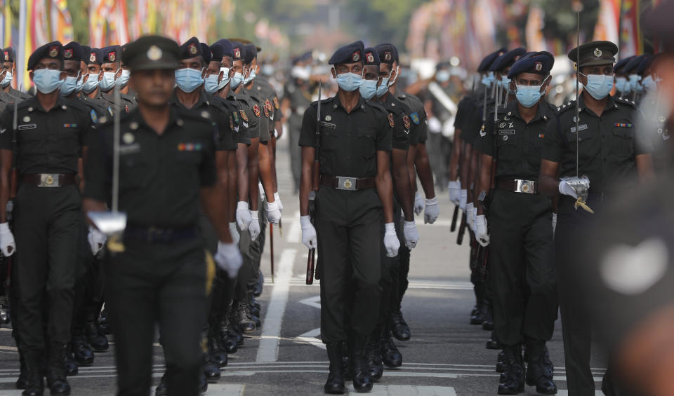 Sri Lankan army soldiers march during the 73rd Independence Day parade rehearsal in Colombo, Sri Lanka, Wednesday, Feb. 3, 2021. Sri Lanka's independence from British colonial rule is celebrated on Feb. 4 each year. (AP Photo/Eranga Jayawardena)