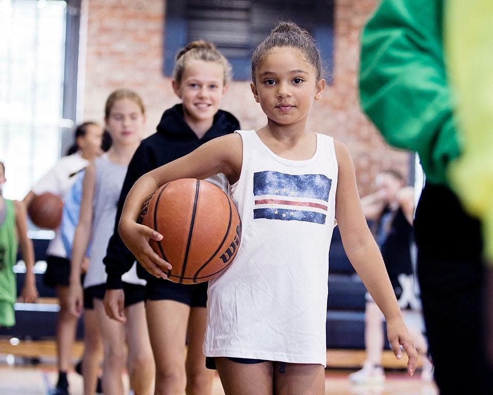 Youth basketball players wear items from the clothing line, Lexicon, Athletic Wear That Inspires.
