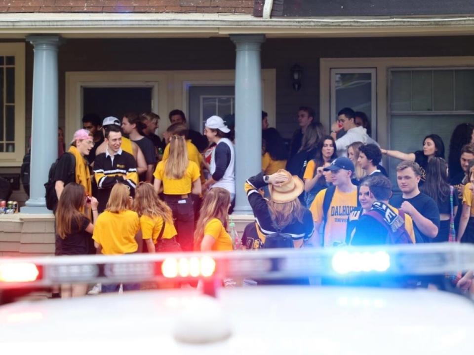 Dalhousie University is trying to deter what it calls a 'toxic party lifestyle' in off-campus parties. This photo was taken at an off-campus party in 2021 that resulted in 10 arrests. (Jeorge Sadi/CBC - image credit)