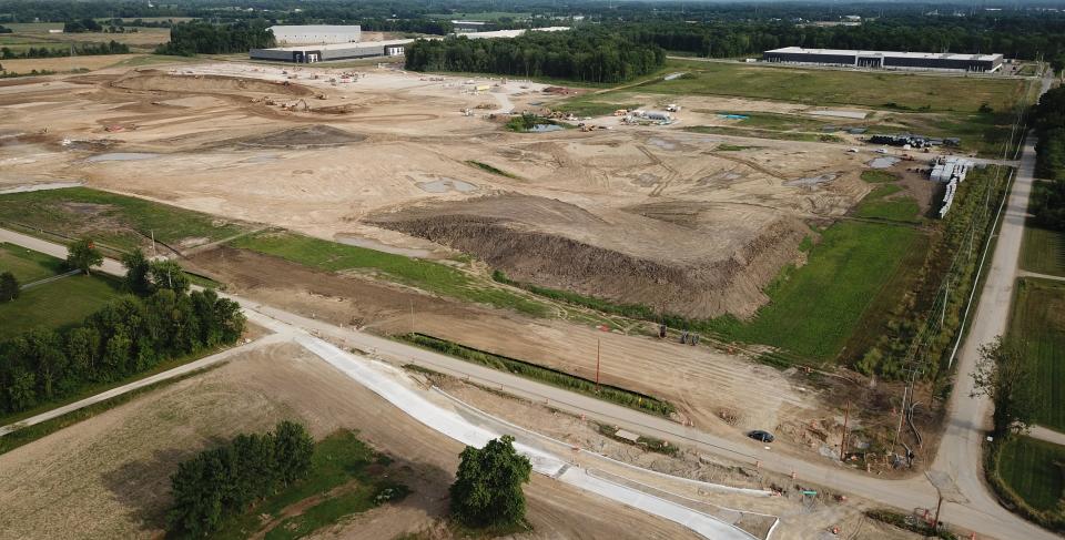 In this July file photo, excavation work continues at the southeast corner of Jug Street. and Harrison Road as ancillary construction is underway for the Intel chip manufacturing site. The main Intel site is a few miles northeast of these fields.