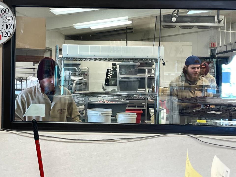 Workers at Cutting Edge Meat Market in Piedmont, S.D., were extremely busy processing deer carcasses and meat on a day in mid-November.