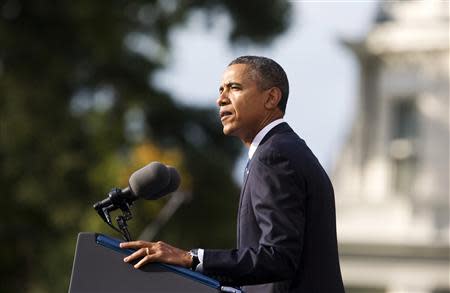 U.S. President Barack Obama speaks at a memorial service after visiting families of victims of the Washington Navy Yard shooting at Marine Barracks in Washington September 22, 2013. Last Monday, a government contractor killed 12 people during rampage at the Washington Navy Yard before police killed him in a gun battle. REUTERS/Joshua Roberts