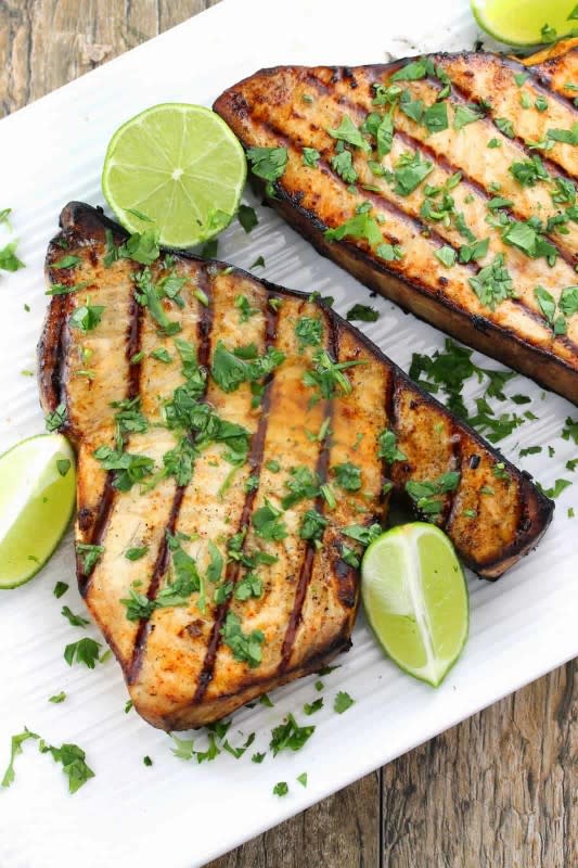 <p>The Stay at Home Chef</p><p>Incredibly tasty and flavorful, this cilantro lime grilled swordfish will have you begging for more.</p><p><strong>Get the recipe: <a href="https://thestayathomechef.com/cilantro-lime-grilled-swordfish/" rel="nofollow noopener" target="_blank" data-ylk="slk:Cilantro Lime Grilled Swordfish;elm:context_link;itc:0;sec:content-canvas" class="link rapid-noclick-resp">Cilantro Lime Grilled Swordfish</a></strong></p>