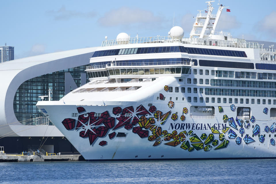 The Norwegian Gem cruise ship is shown docked, Monday, Aug. 9, 2021, at PortMiami in Miami. A federal judge has temporarily blocked a Florida law that prevents cruise lines from requiring passengers to prove they're vaccinated against COVID-19. Judge Kathleen Williams says it fails to protect people even as it appears to violate the free speech rights of cruise lines. She says Norwegian Cruise Lines has shown that without proof of vaccination, cruising will jeopardize public health by potentially causing 