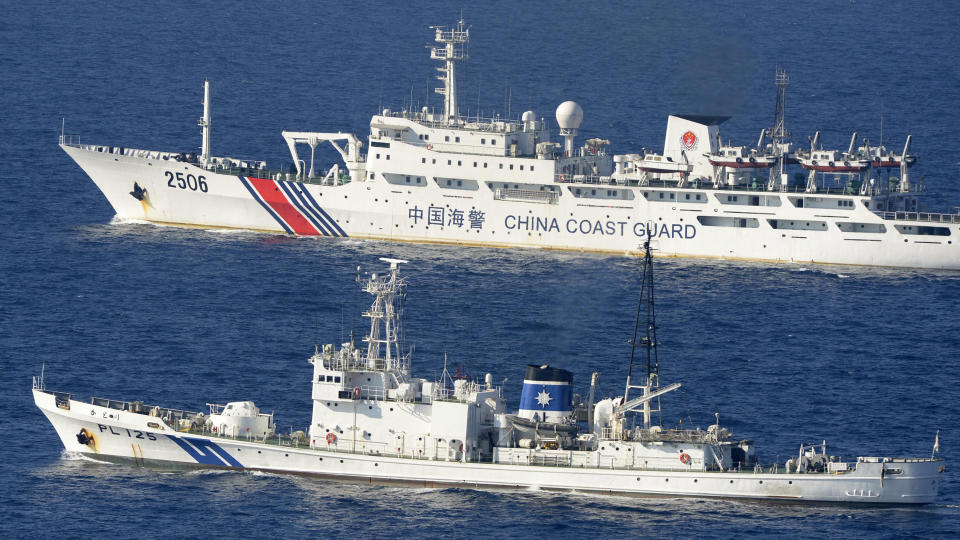 In this Wednesday, Sept. 11, 2013 photo, a China coast guard vessel numbered 2506, top, sails along the Japan coast guard ship Katori in the continuous zone of Japan's territorial waters off the disputed East China Sea islands called Senkaku in Japanese and Diaoyutai in Chinese. A big problem for China is its bad blood with virtually all of its neighbors, many of whom are key players in the search of missing Malaysia Airlines Boeing 777. China has territorial disputes with India, Japan, the Philippines and Vietnam, and many other countries in the region are wary of its efforts to exert more control over Pacific shipping lanes that could impact their freedom of trade. (AP Photo/Kyodo News) JAPAN OUT, MANDATORY CREDIT