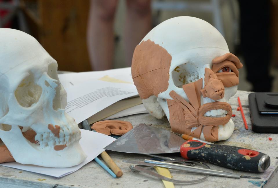 Each participant in the Forensic Skull Sculpture Workshop at Ringling College of Art and Design received a 3D printed replica skull from an actual cold case. Students then use clay to build muscles and facial features, hoping their final sculpture will be recognized by someone.
