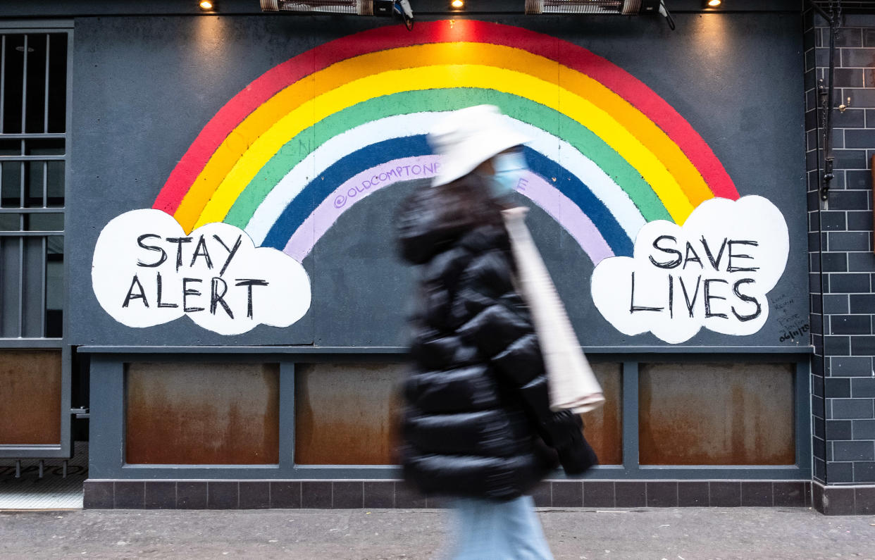  Pedestrian walks past a COVID-19 sign encouraging people to stay alert and save lives. Department of Health and Social Care recorded a total of 3,817,176 infections, 106,158 death and 1,673,936 recovered since the beginning of the outbreak. (Photo by May James / SOPA Images/Sipa USA) 