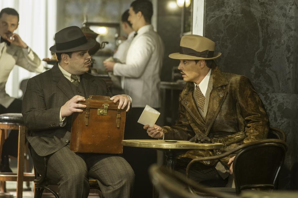Josh Gad and Johnny Depp in <em>Murder on the Orient Express</em>.